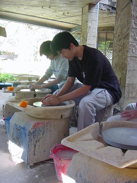 DSC00097.jpg - my cousin doing pottery.